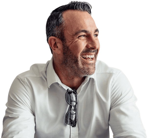 male patient smiling after getting root canal therapy in Fort Worth
